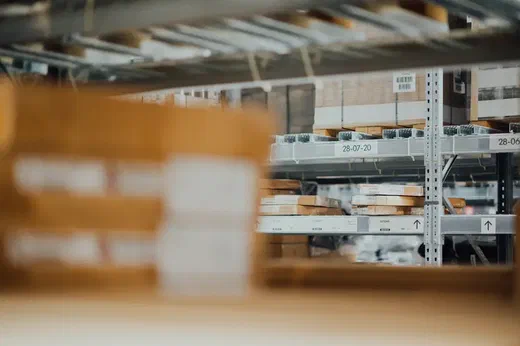 An image of shelves in a stock room