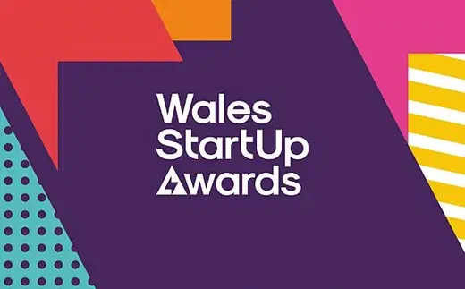 Wales StartUp Awards logo on a purple background with colourful geometric shapes